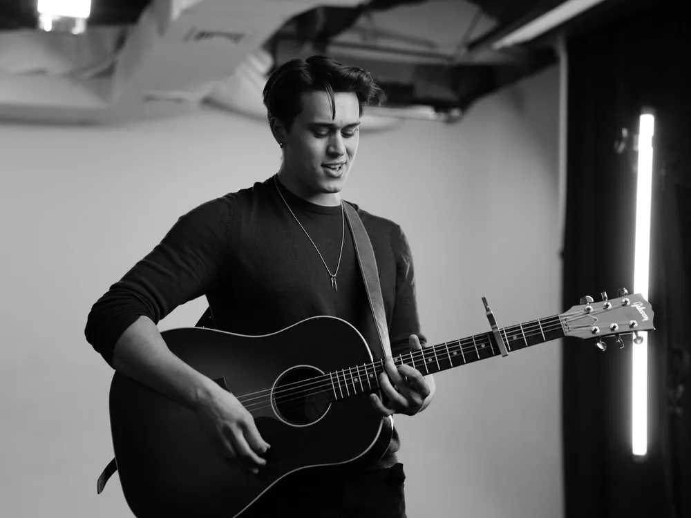 Guitarist in a black and white portrait